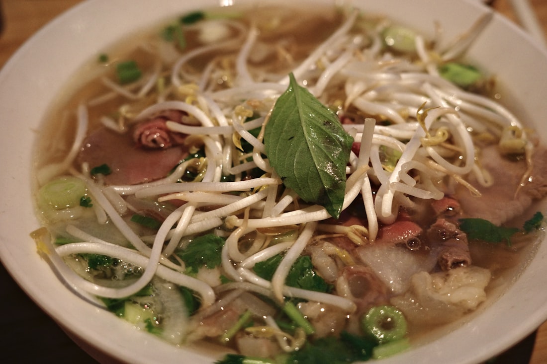 Vietnamese noodles served dry with beef, herbs, and dipping sauce — a different interpretation of bún bò
